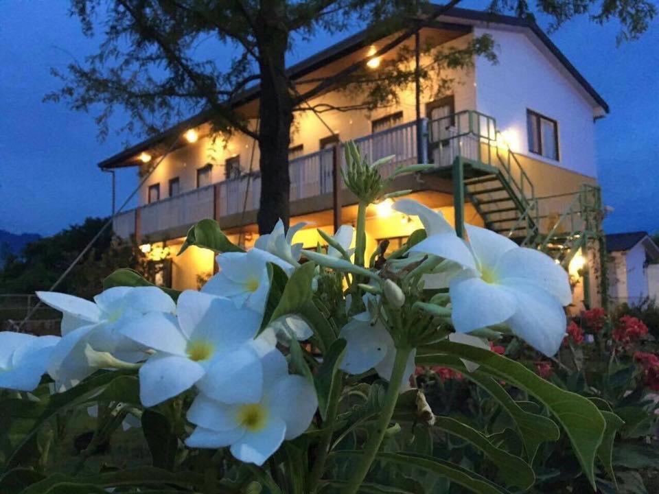 Lei Mi Er Hua Yuan Min Su Apartment Pinghe Exterior foto